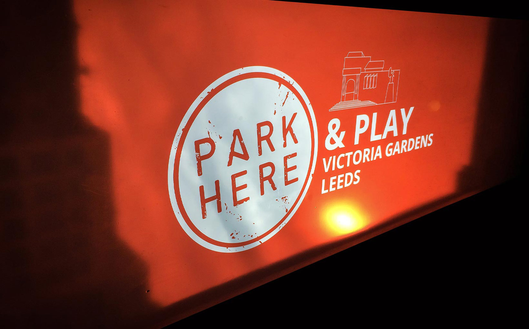 PARK HERE and Play logo